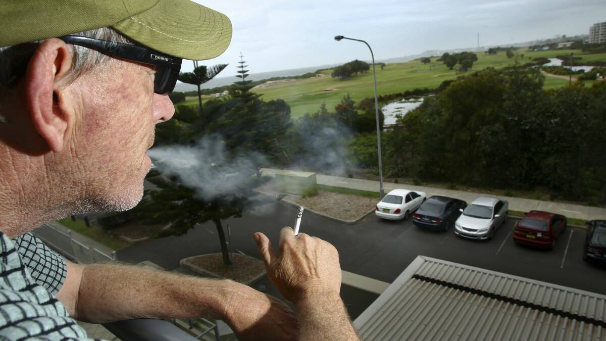 Puffing may be banned from balconies. Pictures: KEN ROBERTSON