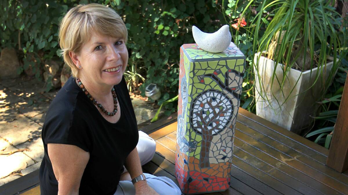 Debbie Lausz with her sculpture, which will be on display this weekend. Picture: ORLANDO CHIODO