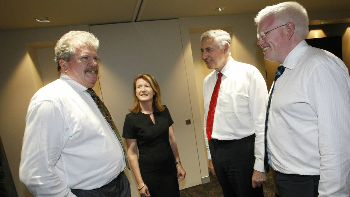 Regional tourism chair Brian Longbottom, left, and deputy Diane Johnston talk tourism with Minister George Souris and MP Gareth Ward. Picture: ANDY ZAKELI