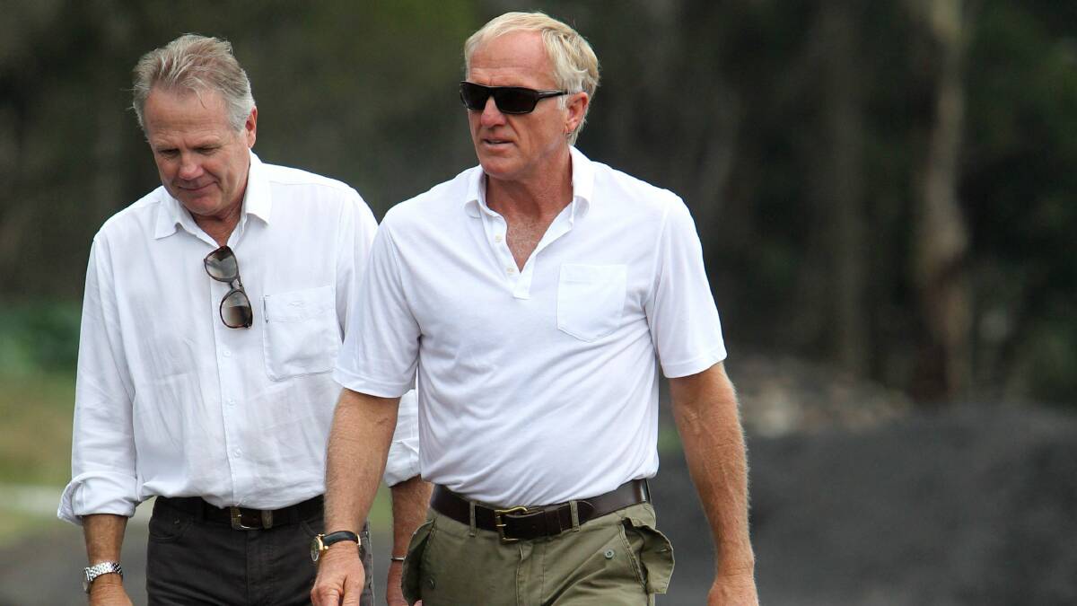 Greg Norman, right, yesterday checks on the site of the golf course. Picture: GREG TOTMAN