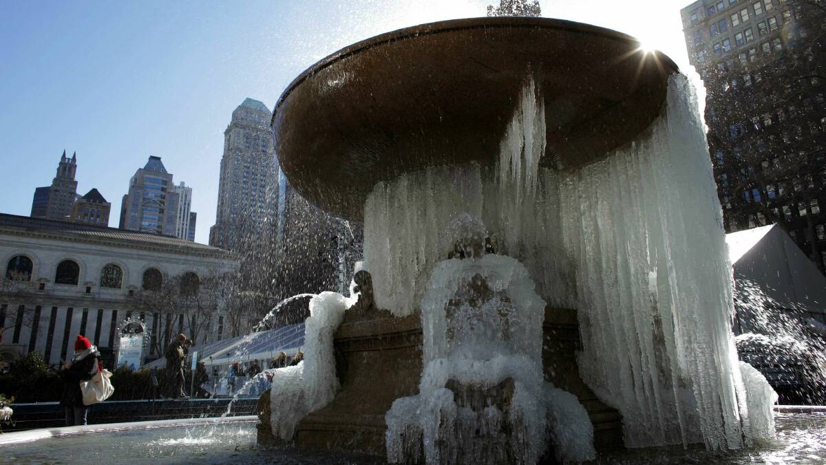 A fountain is frozen in Bryant Park in New York City. Picture: REUTERS