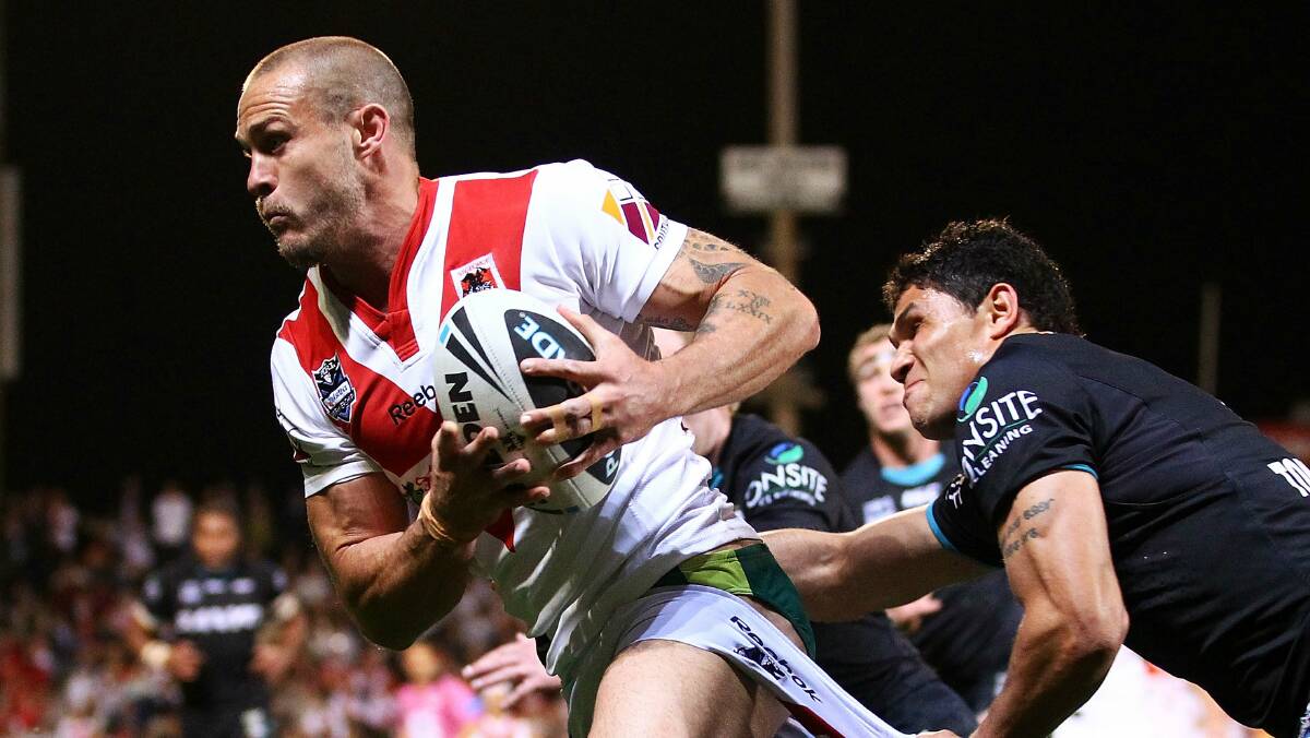 Matt Cooper in action against the Panthers in 2011. Picture: Getty Images