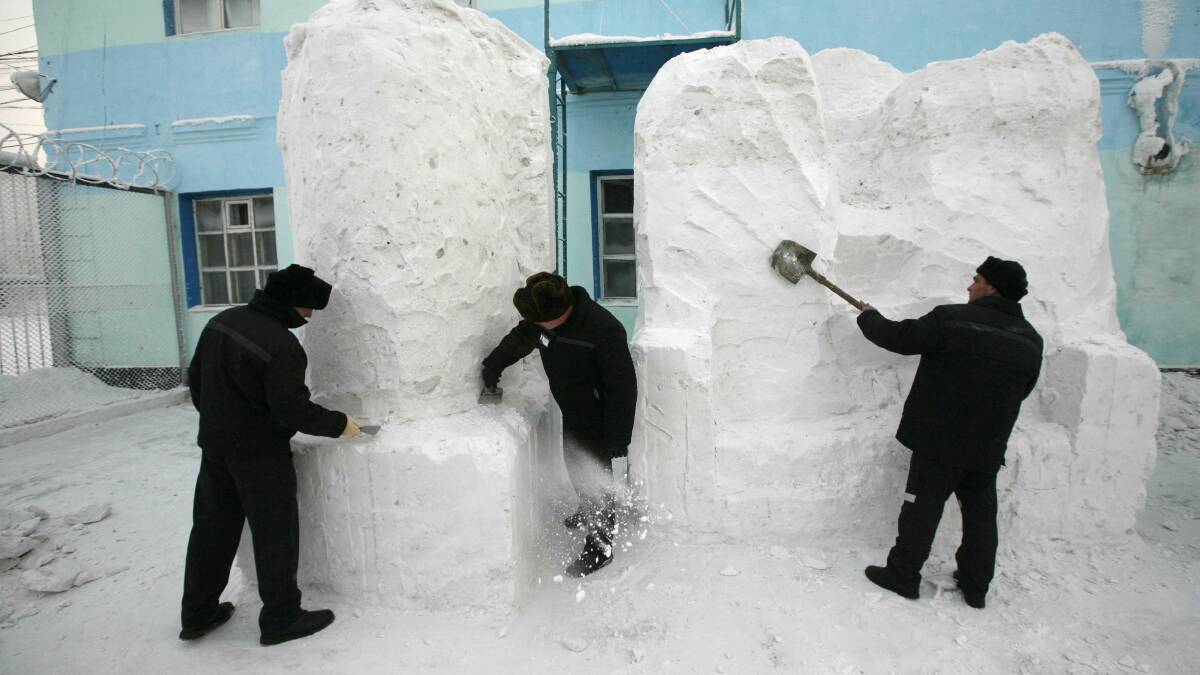 Inmates create ice sculptures in Krasnoyarsk, Russia. Picture: REUTERS