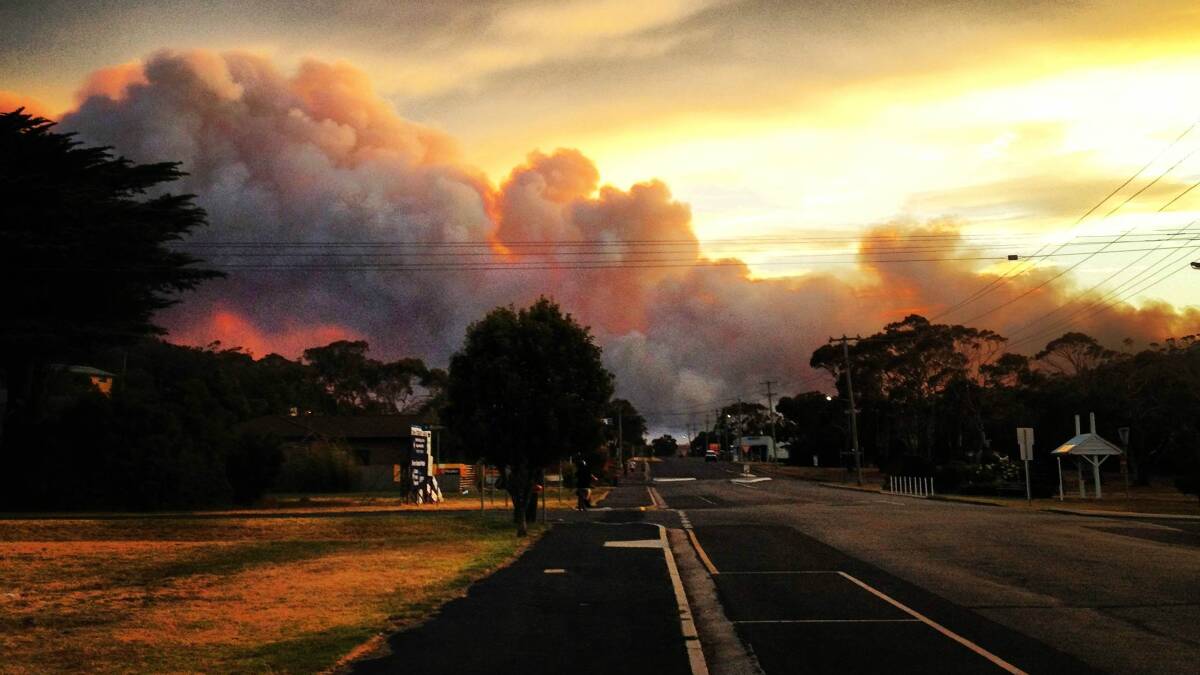 A fire rages outside the town of Bicheno, Tasmania, this week. Picture: HANNAH WOOLLEY