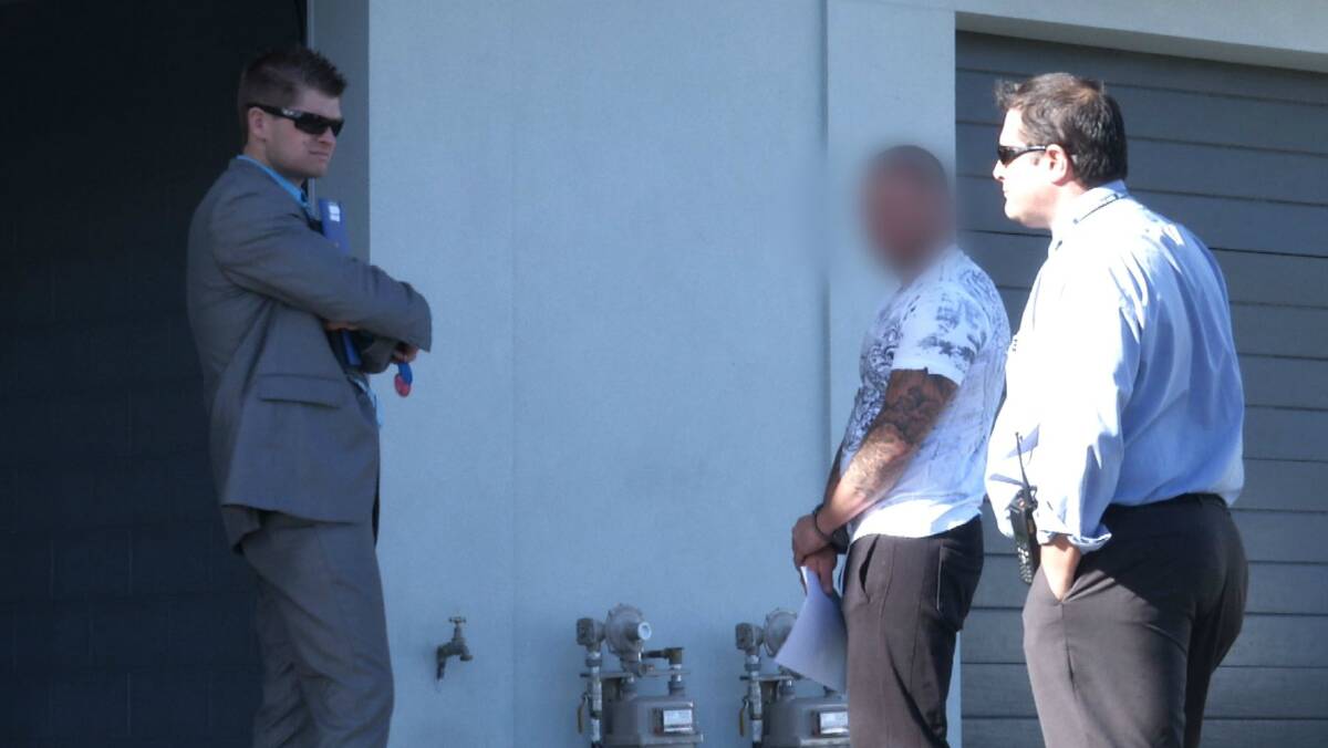 Police arrest the first man this morning. Picture: NSW POLICE