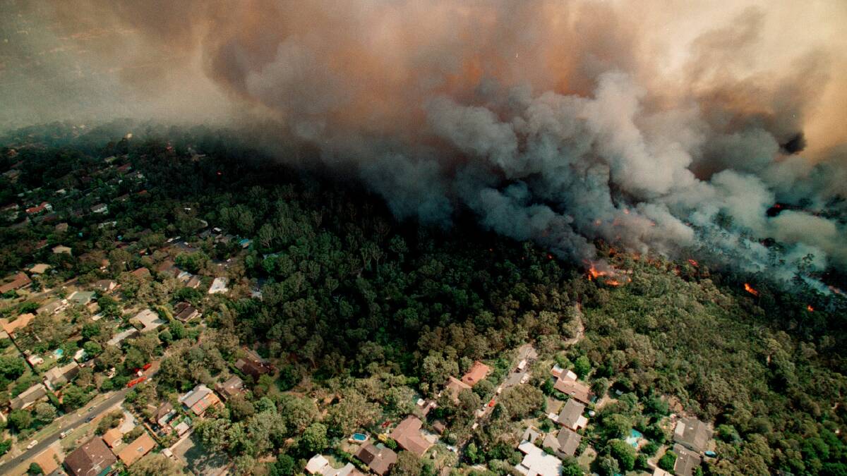 Bushfires rage close to homes in Pennant Hills, in Sydney's west, in 2001. Picture: PENNY BRADFIELD