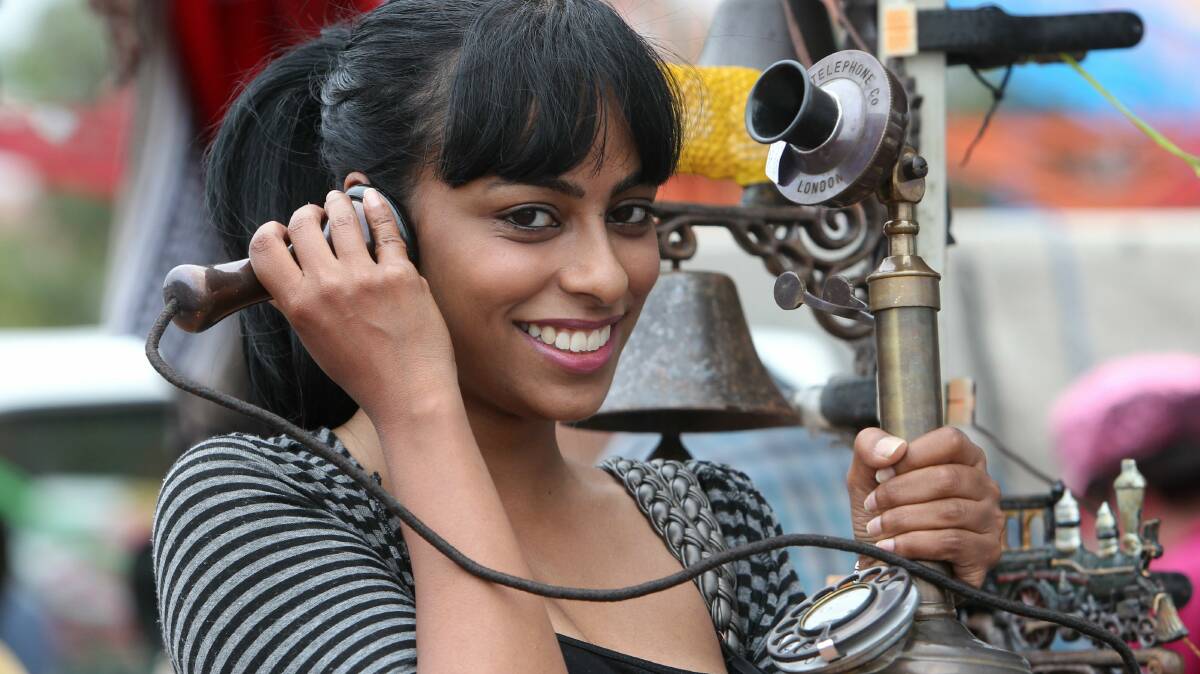 Neeka Babar tries out the vintage phone. 