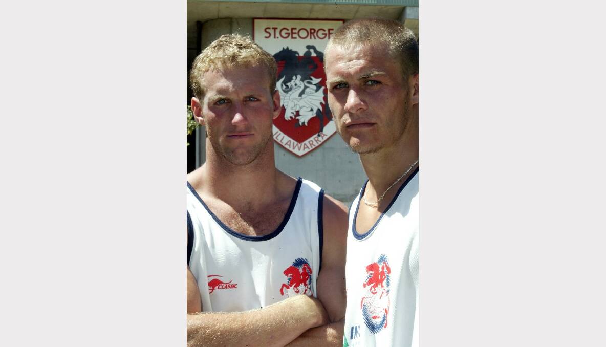 Matt Cooper with teammate Mark Gasnier in 2003. Picture: Robert Peet