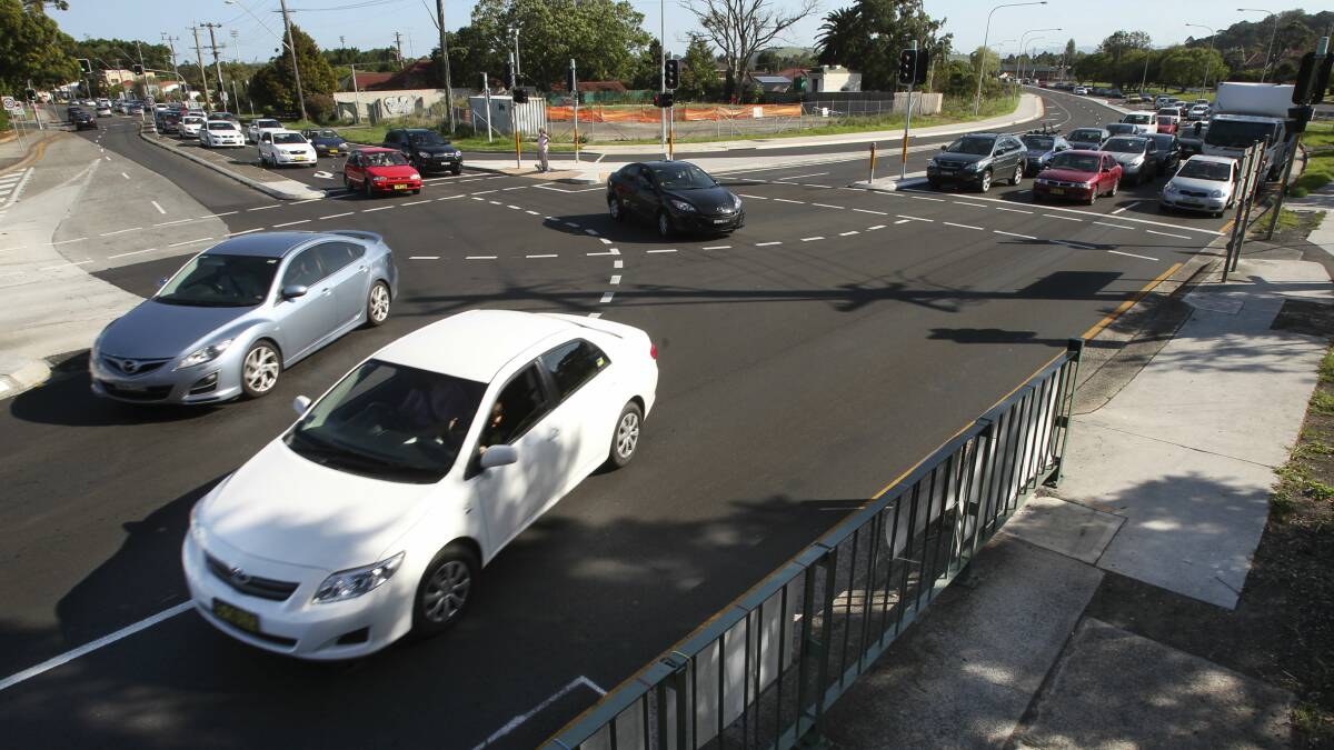 Motorists use the completed Figtree intersection. Picture: KEN ROBERTSON