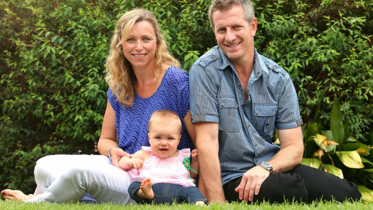  Toni Mills and partner Ross Gliddon with their baby Zoe. Picture: KIRK GILMOUR