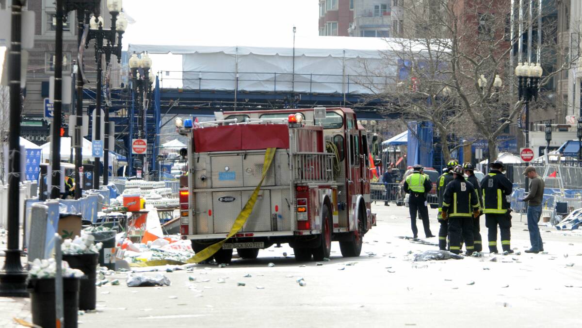Firefighers attend to the site of the explosions in Boston. Picture: GETTY IMAGES