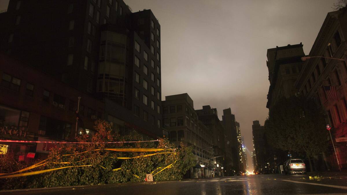 A fallen tree lies in the Chelsea neighbourhood of New York City. Picture: REUTERS