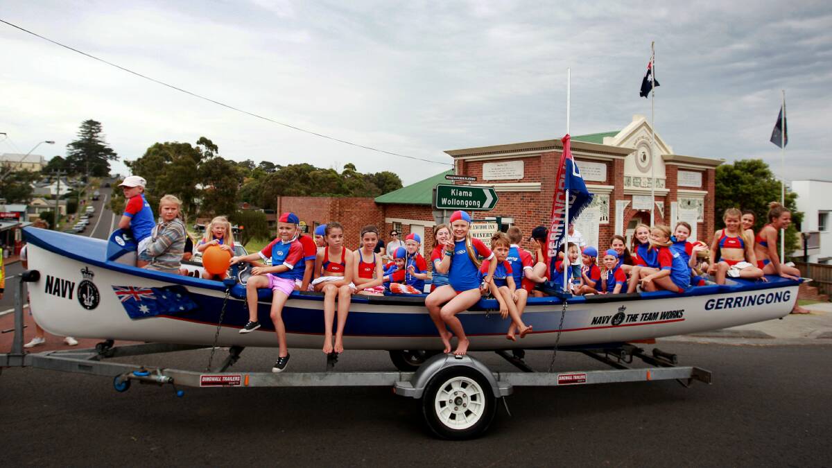 Gerringong nippers wave to the crowd. Pictures: SYLVIA LIBER