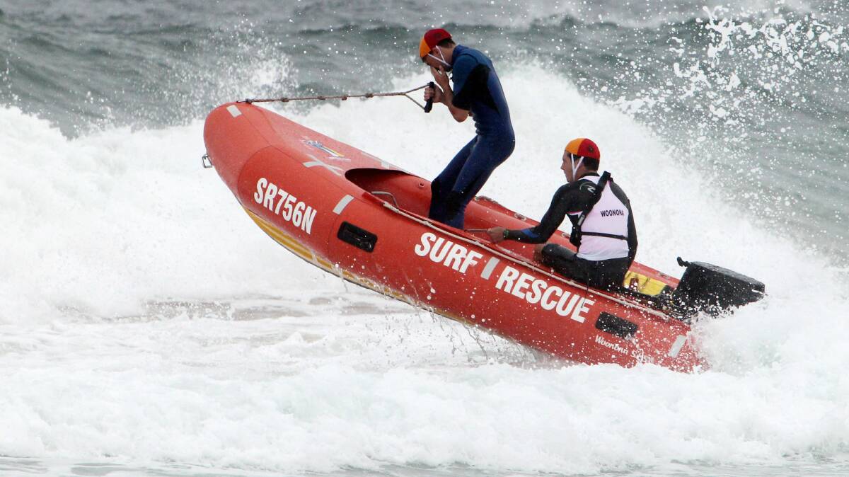 A highlight was the mock rescue in the surf off Woonona Beach. Pictures: GREG TOTMAN