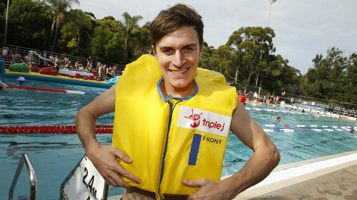 Triple J presenter Alex Dyson joined the Hawaiian pool party at UOW. Pictures: ANDY ZAKELI
