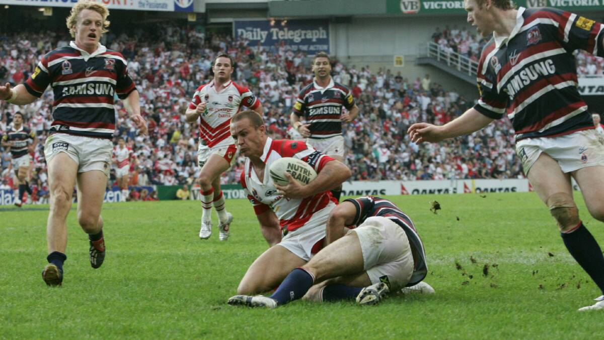 Matt Cooper in action against the Roosters in 2005. Picture: Tim Clayton