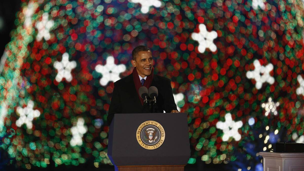 US President Barack Obama lights the national Christmas tree in Washington, DC.  Picture: REUTERS