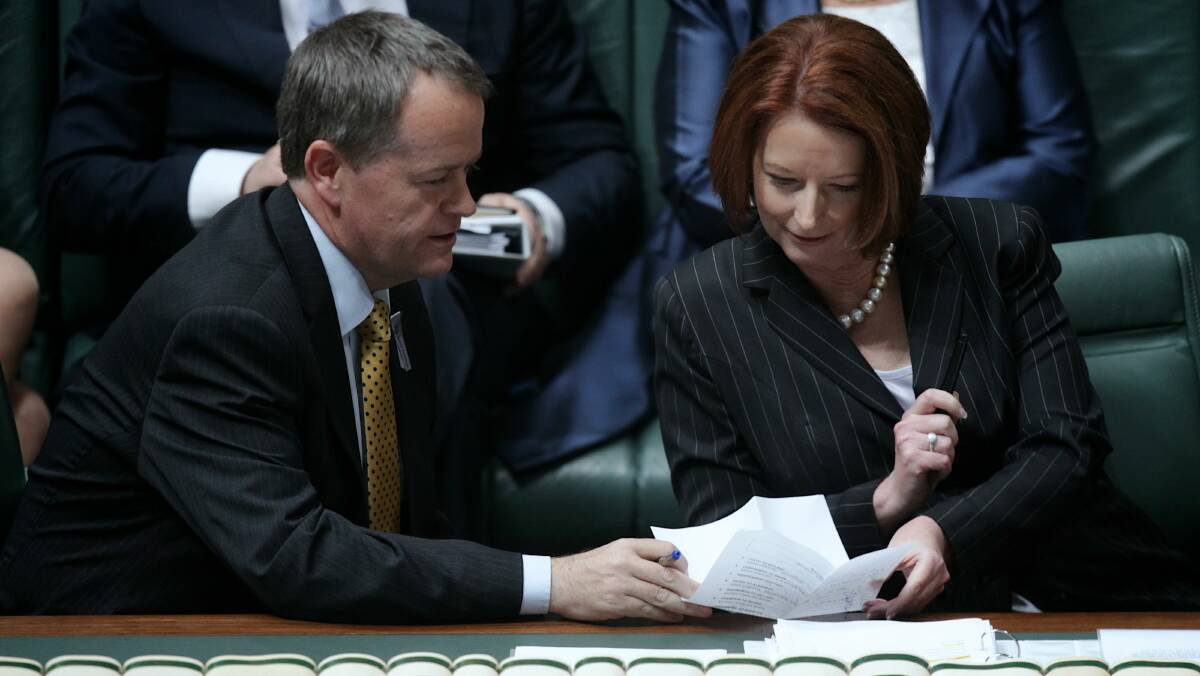 Workplace Relations Minister Bill Shorten with Prime Minister Julia Gillard. Picture: ALEX ELLINGHAUSEN