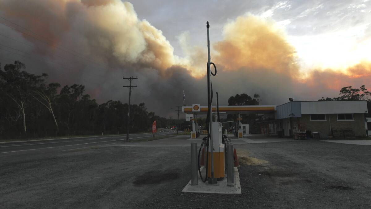 The fire burns south of Wandandian yesterday. Picture: NICK MOIR