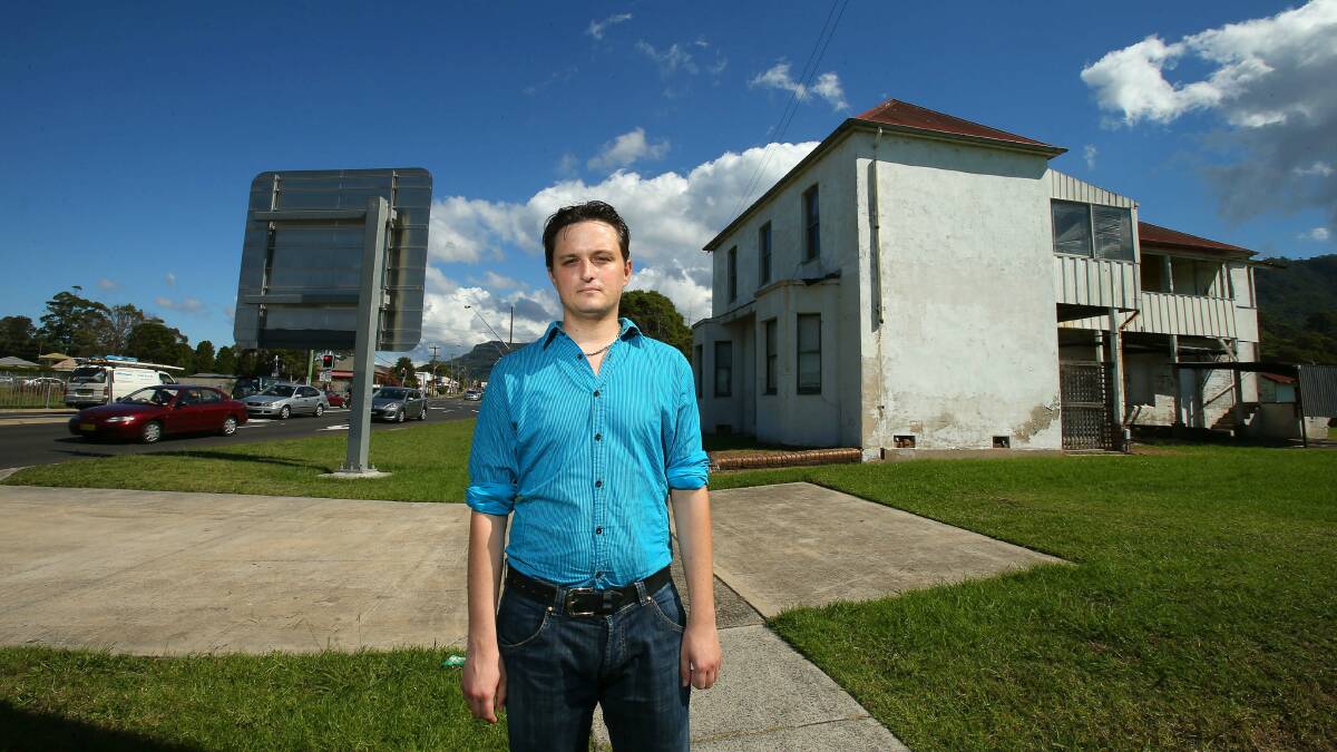 Mitchell Gordon outside the former Seaview guest house  at Bulli. Picture: KIRK GILMOUR