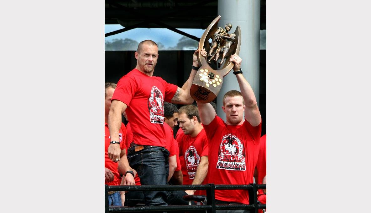 Matt Cooper with Dragons teammate Ben Creagh celebrating their premiership in Wollongong in 2010. Picture: Orlando Chiodo