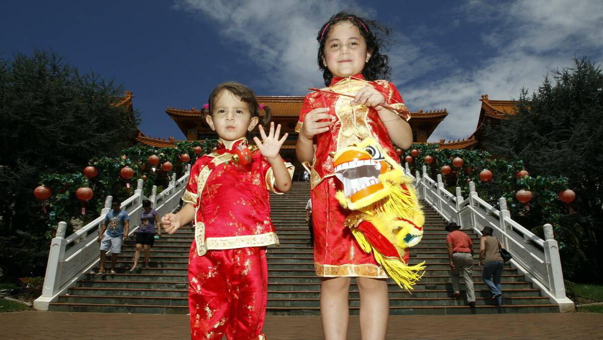 GALLERY: Lion dance ushers in Chinese New Year