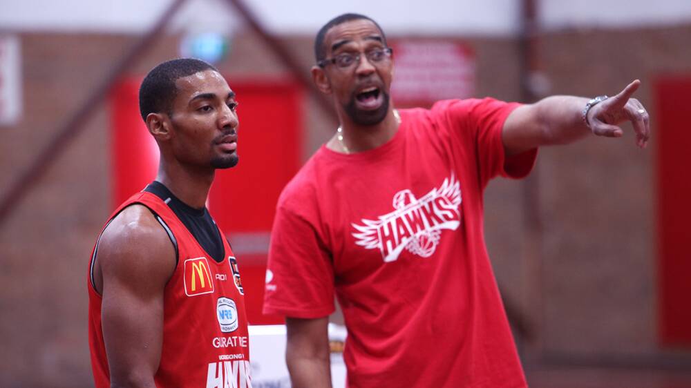 New import Lance Hurdle, pictured with Hawks assistant coach Eric Cooks, was impressive in his first game for Wollongong. 
