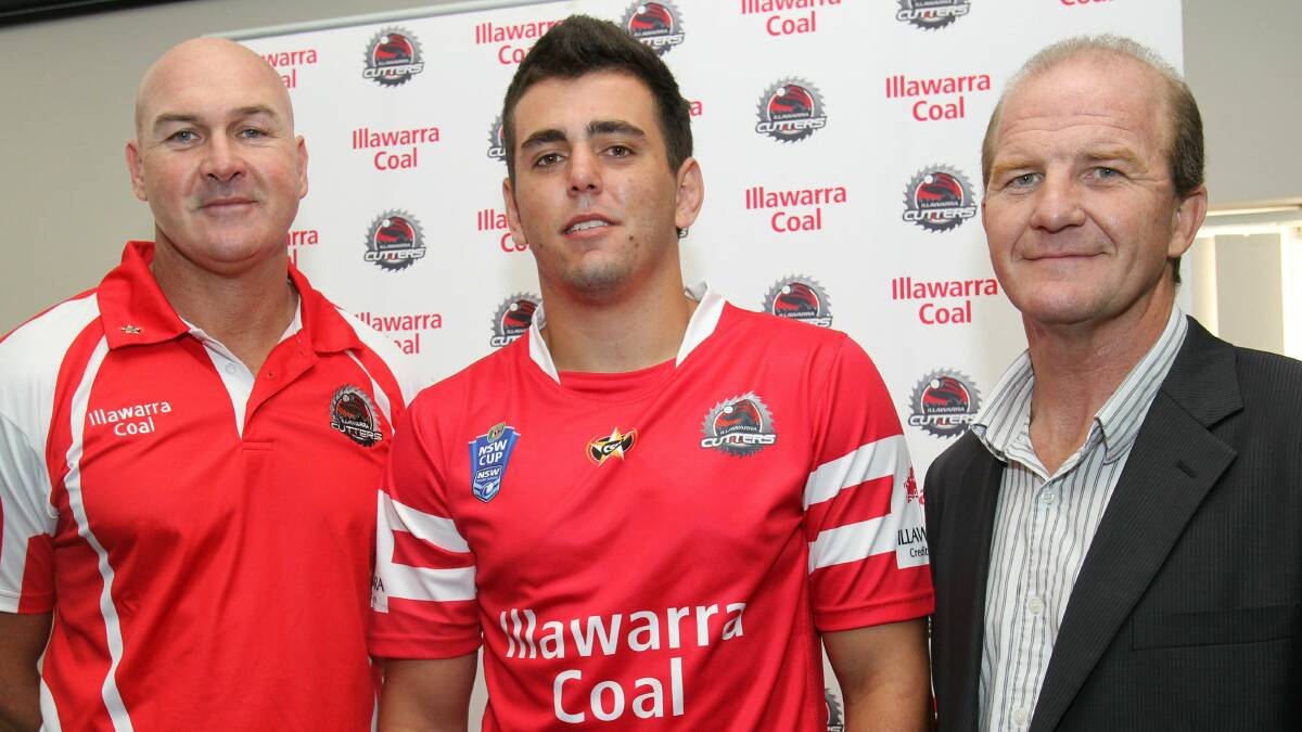 Coach Paul McGregor, left, player Jordan Hay and chairman Sean O'Connor launch the Illawarra Cutters' new strip. Picture: GREG TOTMAN