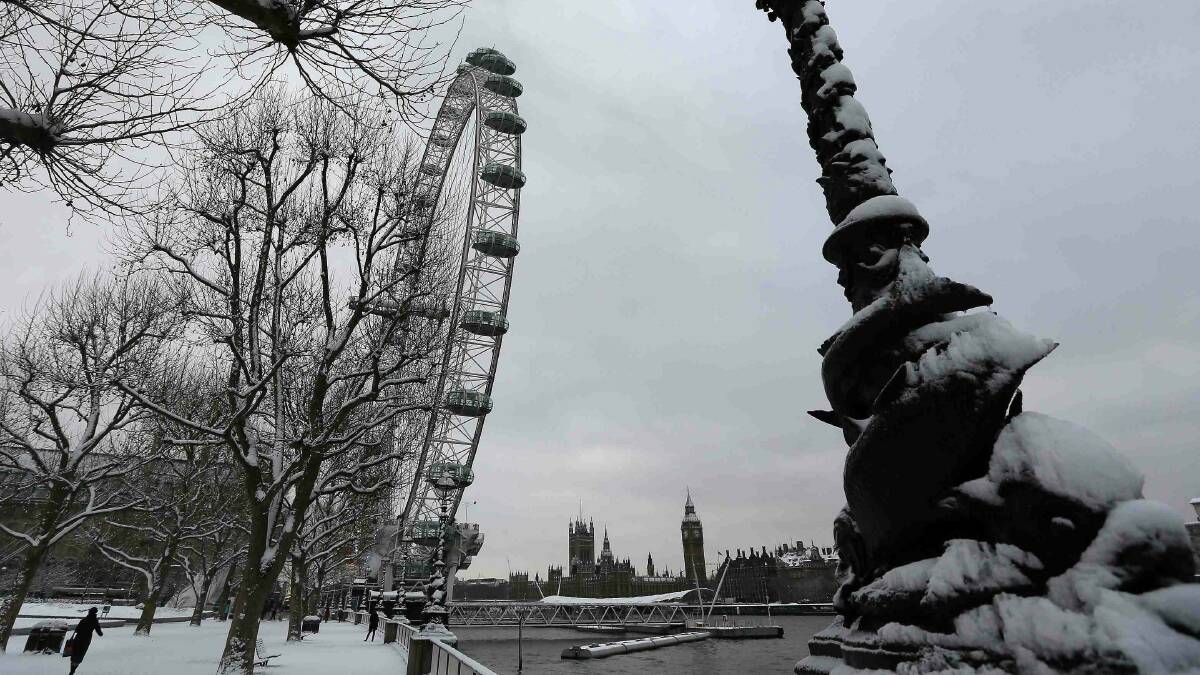 The London Eye is covered in snow in London. Picture: REUTERS