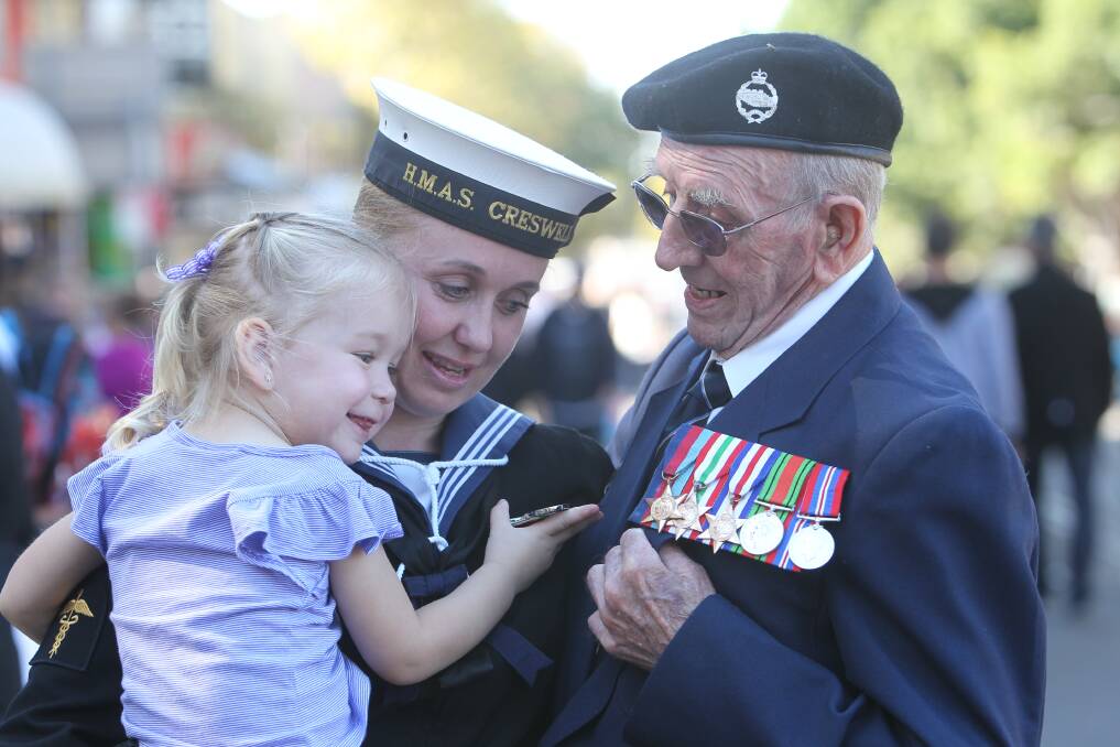 Ebony with her great-grandfather, Fred Gregory, and mother Kelly Gallagher on Anzac Day. Picture: GREG TOTMAN