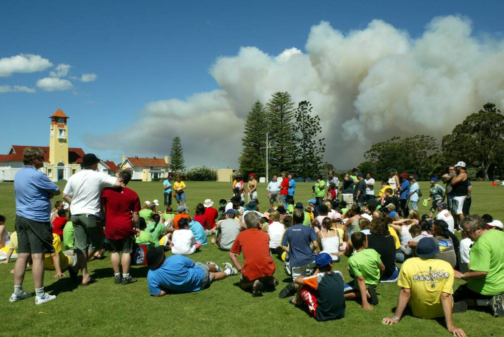  Camp Quality children and carers gather for a rollcall at HMAS Creswell as the Booderee National Park bushfire threatens.