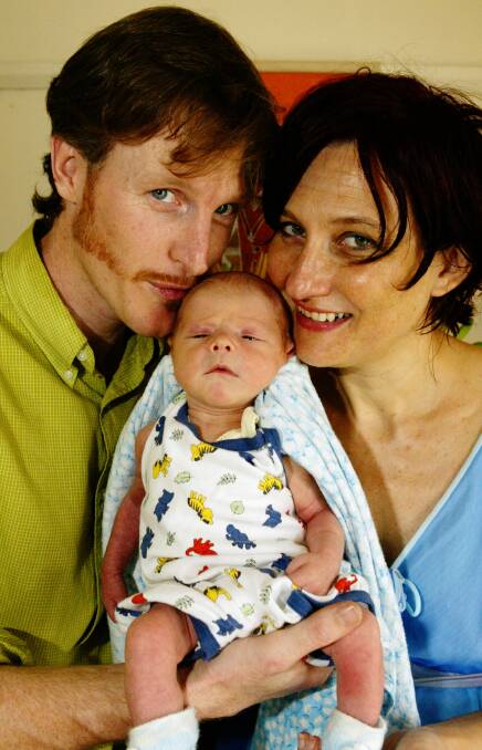 Viva la Gong organisers Alastair Lyall and Amanda Buckland with their newborn son Jasper.