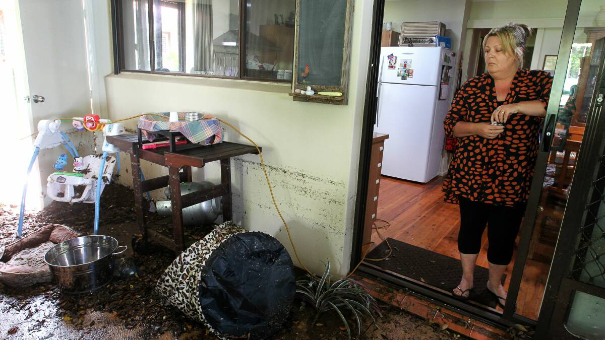 Jean Lamacchia in her wrecked home at Mount Warrigal. Picture: SYLVIA LIBER