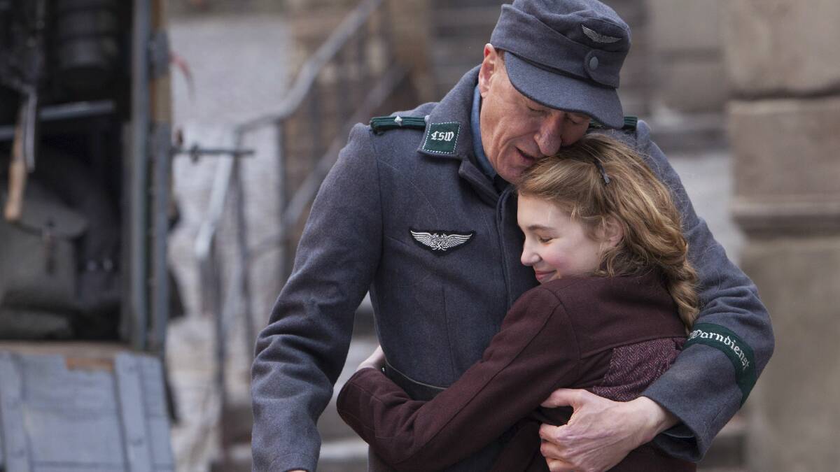 Geoffrey Rush and Sophie Nelisse in a scene from the Book Thief.