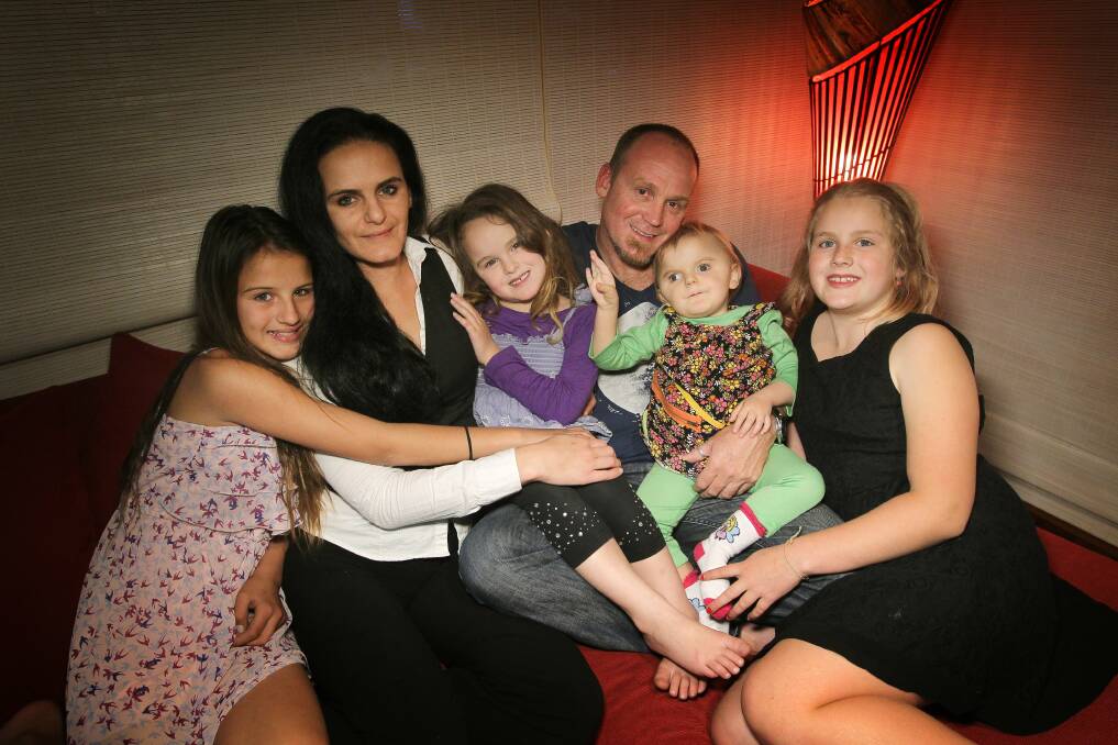 Bella with her mum and dad Michelle and Scott and sisters Kai, Mahala and Talullah. 