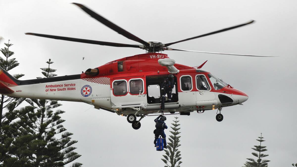 Paramedics flew in to attend to a spear fisherman who got into difficulties at Storm Bay at Kiama on Tuesday. Picture: DAVID HALL