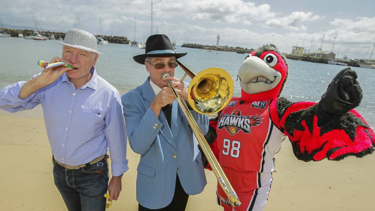 Lord Mayor Gordon Bradbery, Wollongong City Brass Band's Lindsay Dunstan and Moe from the Wollongong Hawks. Picture: CHRISTOPHER CHAN
