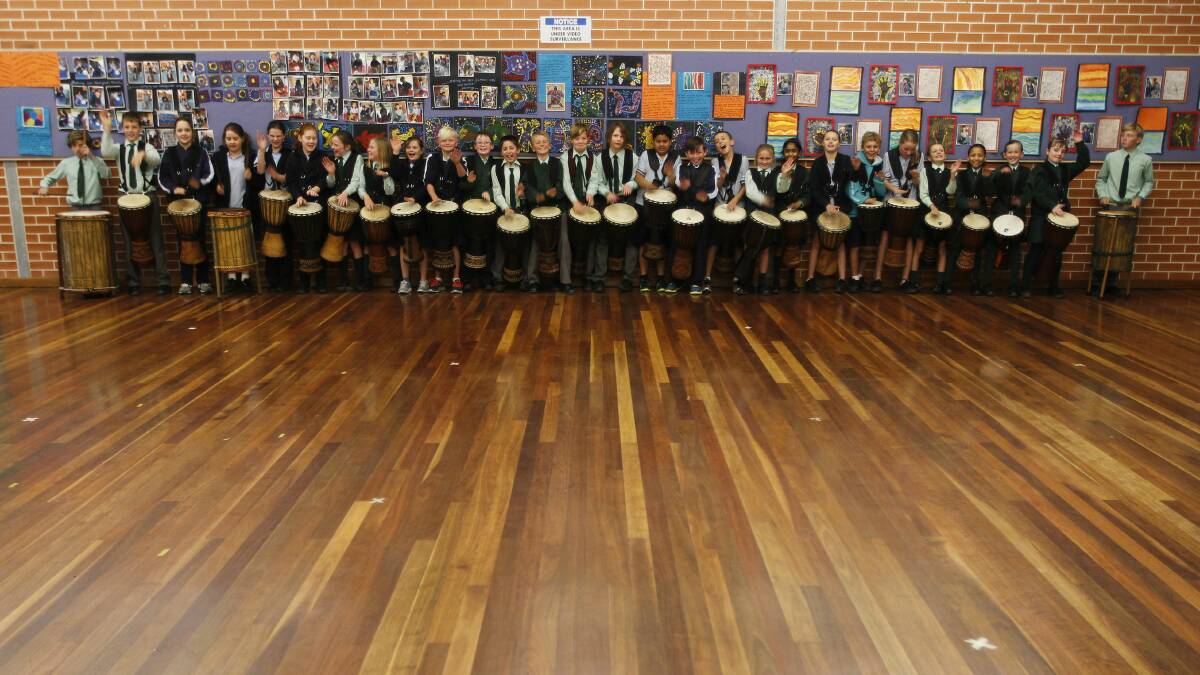 Students drumming to the beat of George Michael hit