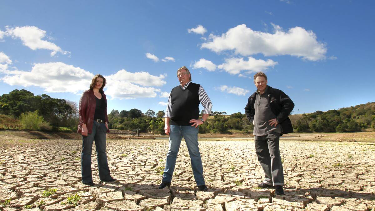 Renata Matyear, Neil Reilly and Simon Mansfield on the dried-up floor of the Jerrara Dam. Picture: DAVE TEASE