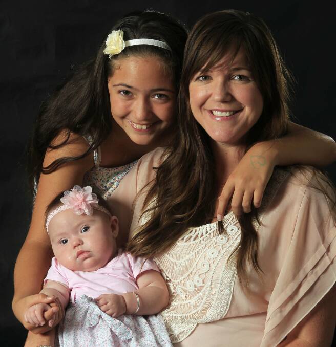 Wave FM breakfast host Jade Papesch with daughters Alani, 11, and Lulu, four months. Picture: ANDY ZAKELI