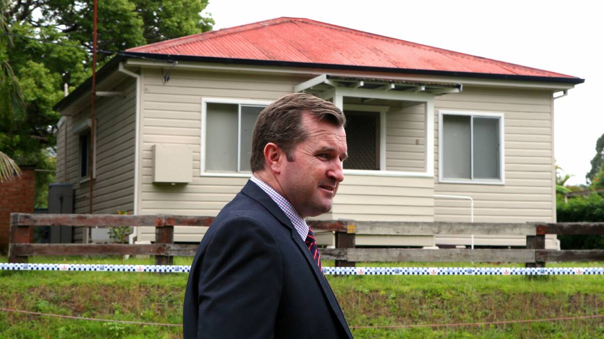 Wollongong police detective acting inspector Darren Kelly outside the home in Hobart Street. Picture: KIRK GILMOUR