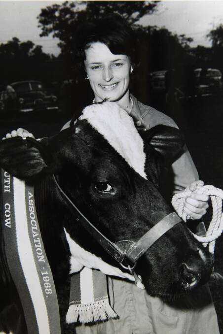 Jan McKenzie (nee Smith) as a teenager with her award-winning cow Eulowarra Echo Paula.