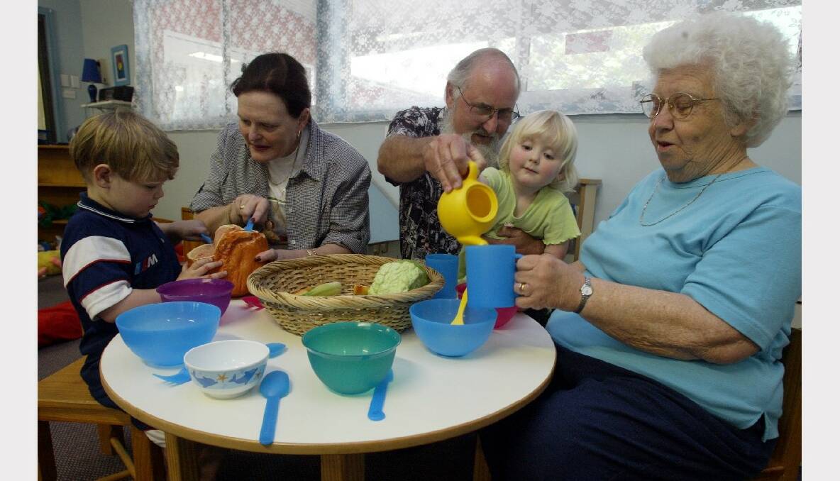 Grandparents Ruth and Rudi Schober and great grandmother Barbara Hayman with Jordan 4, and Jessica, 2 at the UOW child-care centre's Grandparents Day.