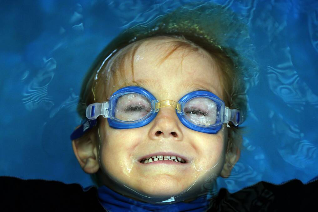 Charli's attitude and fear of the water changed after five swim lessons. Picture: SYLVIA LIBER