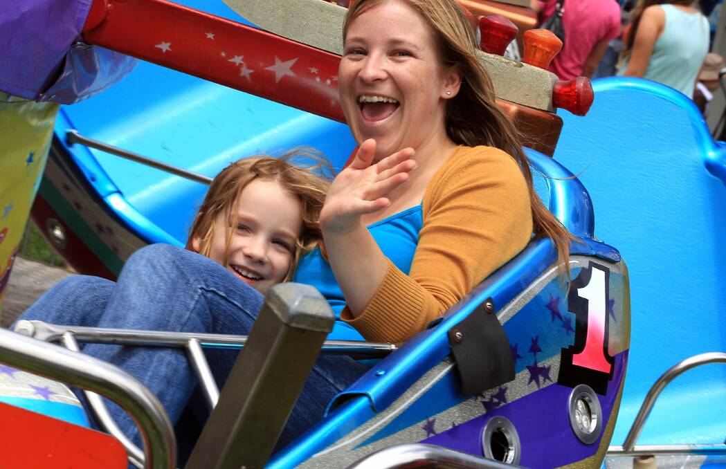 Kalissa and Patricia enjoy the rides at Belmore Basin. Picture: ORLANDO CHIODO