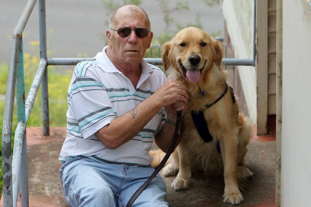 Chris Paull and his two-year-old seeing-eye dog Hero. Picture: GREG TOTMAN