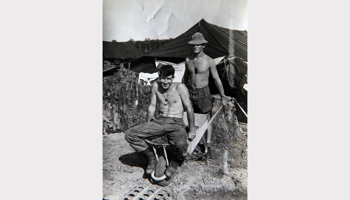 Corporal Smith (in barrow) photographed in Vietnam.