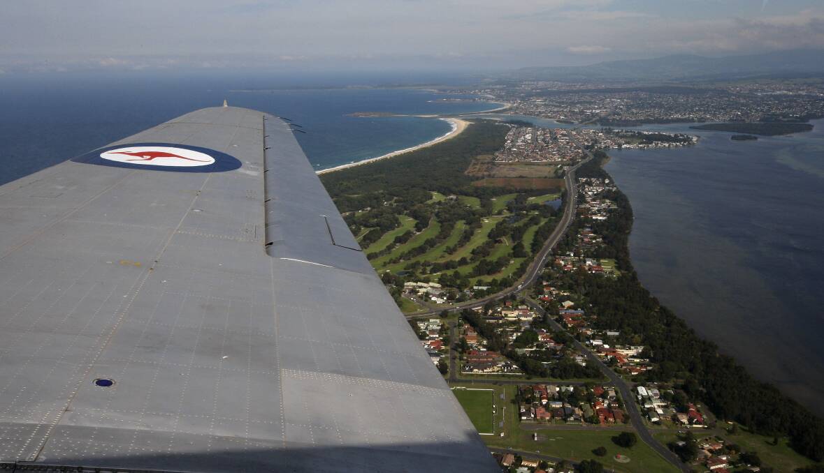 The view from a window on the Douglas C-47 Dakota, which flew between Albion Park Rail and Clifton yesterday. Pictures: ANDY ZAKELI