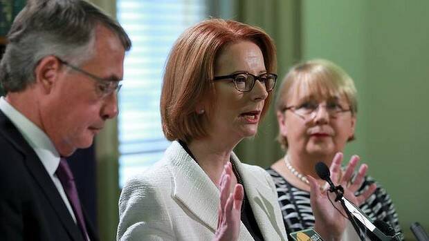 Julia Gillard, Wayne Swan and Jenny Macklin announce a Medicare levy raise to fund an NDIS. Picture: KEN IRWIN