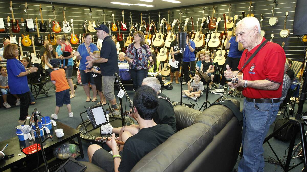 Glenn Haworth completes a world record attempt for playing ukelele 25 hours straight.